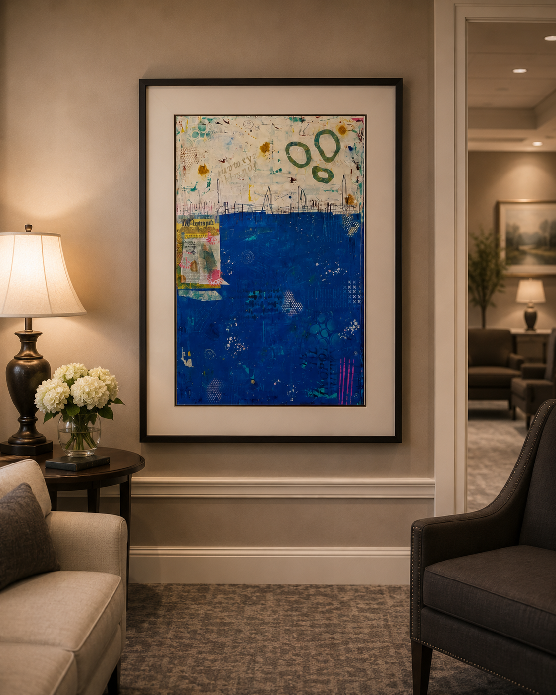 A framed memorial painting displayed in a serene funeral home lounge