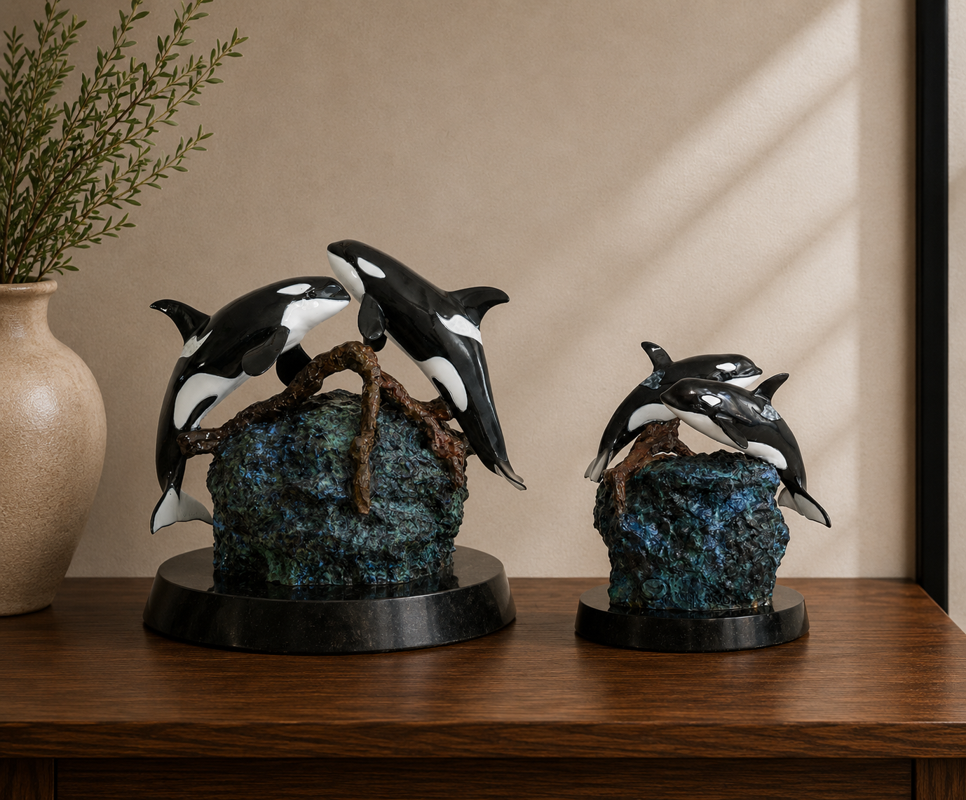 Devotion — Wyland bronze orca memorial sculpture urns in two sizes