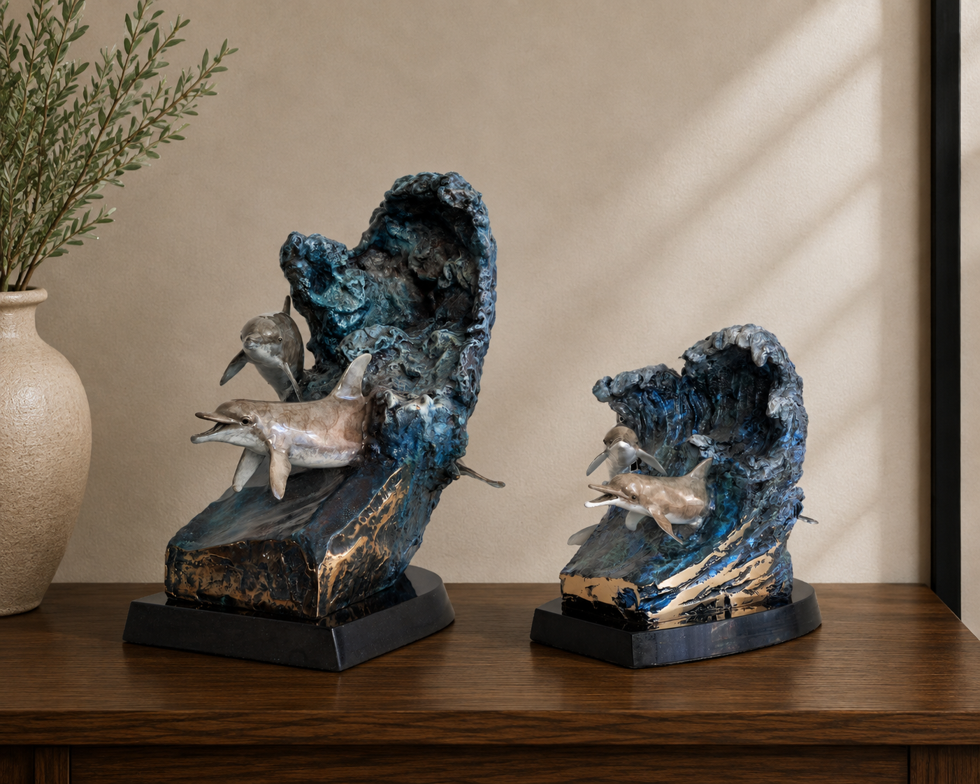 Serenade — Wyland bronze dolphin memorial sculpture urns in two sizes